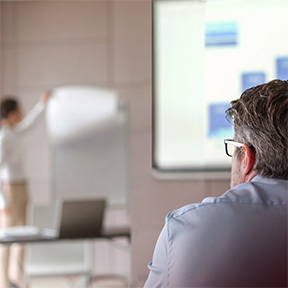 Close up of businessman watching a presentation