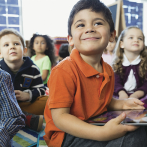 Kid in class Back to school finance tips